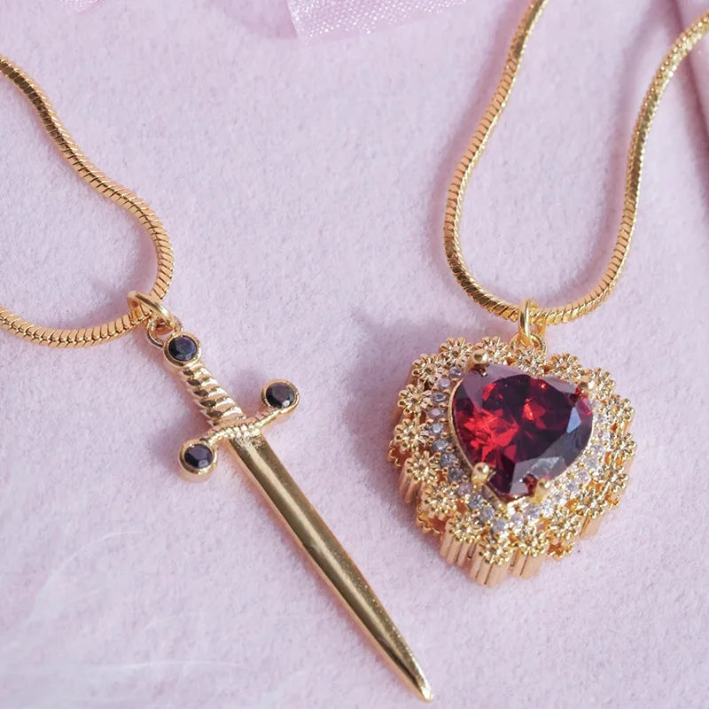 Slay the Style Game with Our Gothic Punk Heart Dagger Necklace! 💖🗡️ Perfect for Couples & Besties! #FashionJewelry #GothicStyle