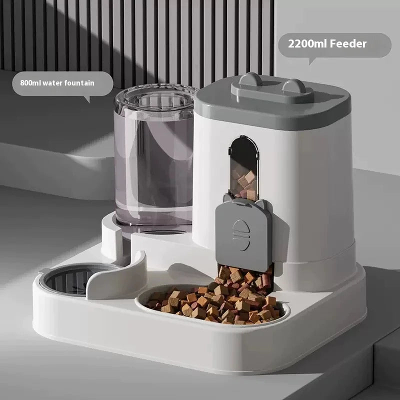 Upgrade your pet's mealtime with our Automatic Cat Feeder & Water Fountain Set! 🐾💧 Perfect for both cats and dogs, made from food-grade plastic with a convenient gravity feed design! 🐱🐶✨